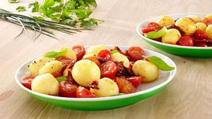 Rezept Gefüllte Mini-Frischkäse-Knödel mit getrockneten Tomaten und Basilikum
